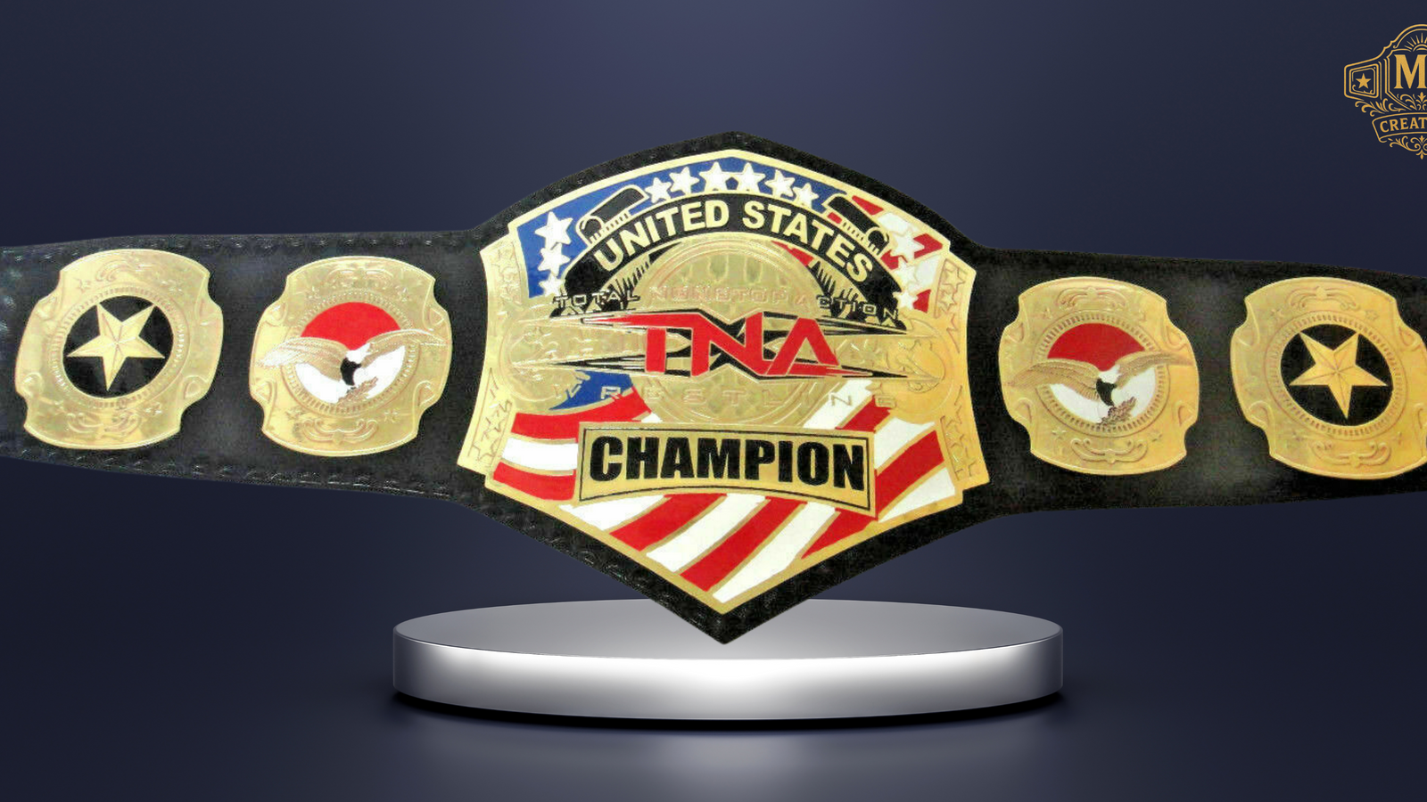 A high-quality studio shot of the tna united states championship belt, prominently displayed on a silver stand against a dark background.