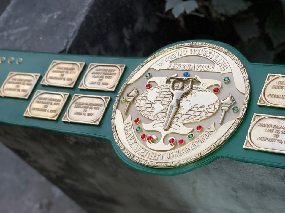 WWF Big Green Heavyweight Championship replica belt, centre plate and name plates close-up