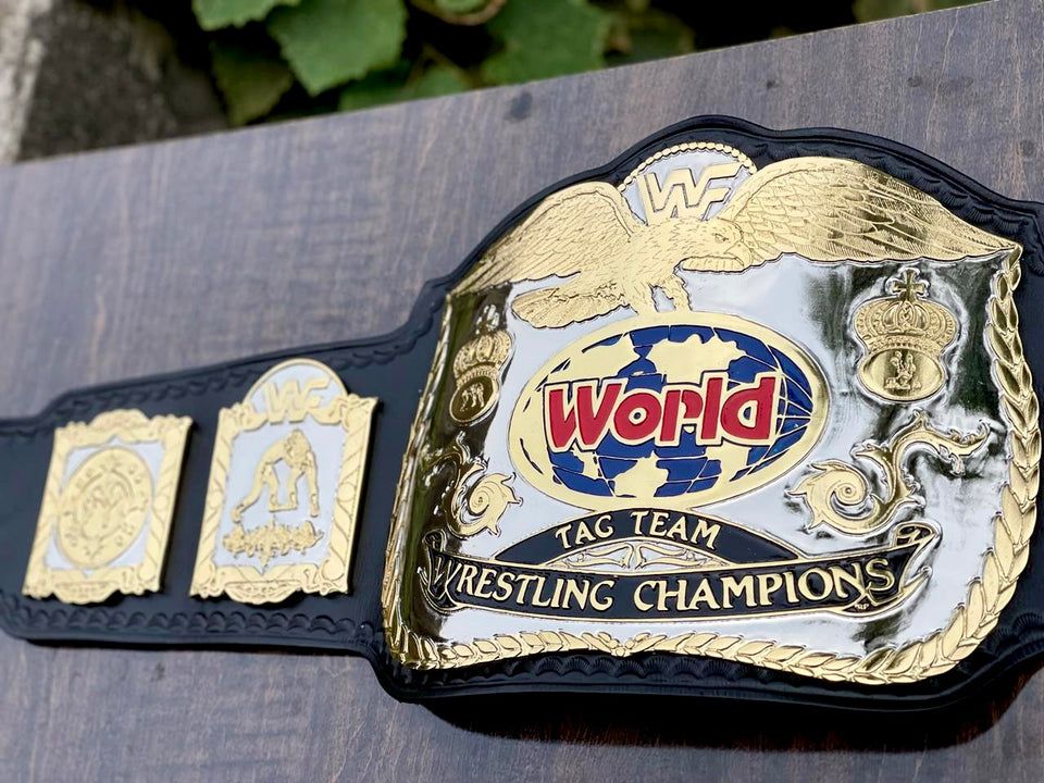 WWF World Tag Team Silver and Gold Championship replica belt, eagle and globe centre plate close-up