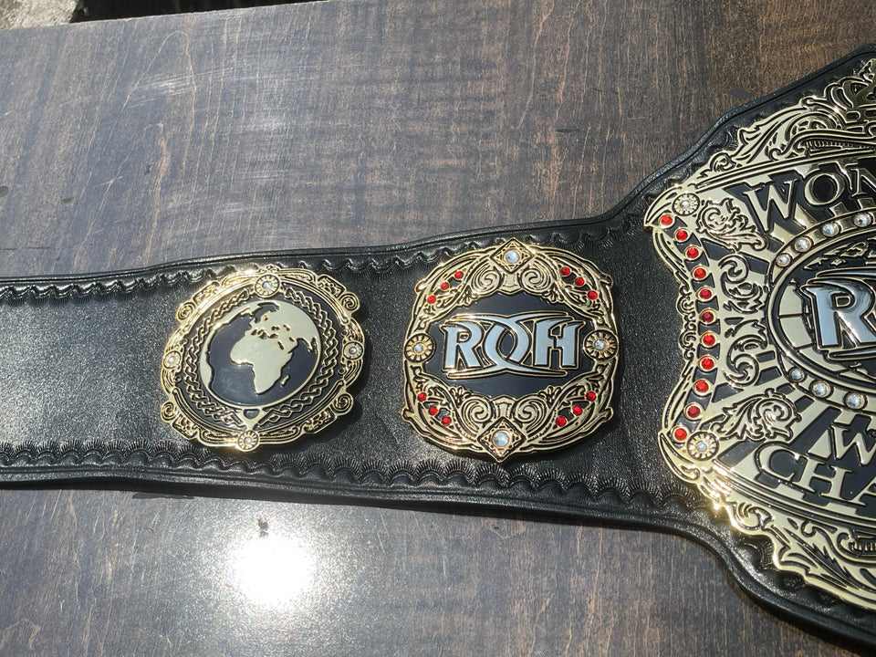 ROH Women's World Championship replica belt, side plates close-up