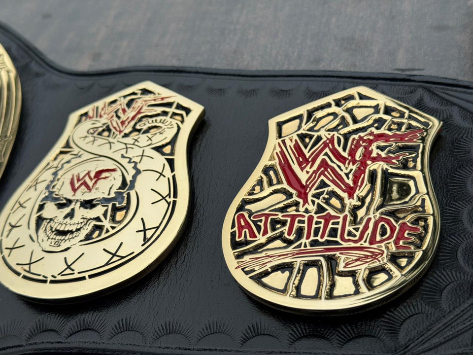 WWF Smoking Skull Championship replica belt, WWF Attitude and skull side plates close-up