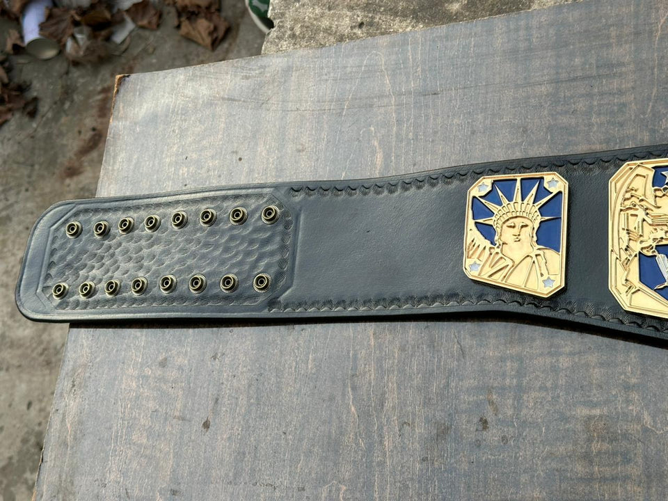 WWE United States Championship replica belt, strap end with snap holes close-up