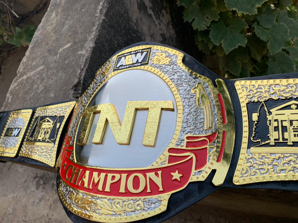 AEW TNT Championship (Black Strap) replica belt, centre plate close-up, photo 5
