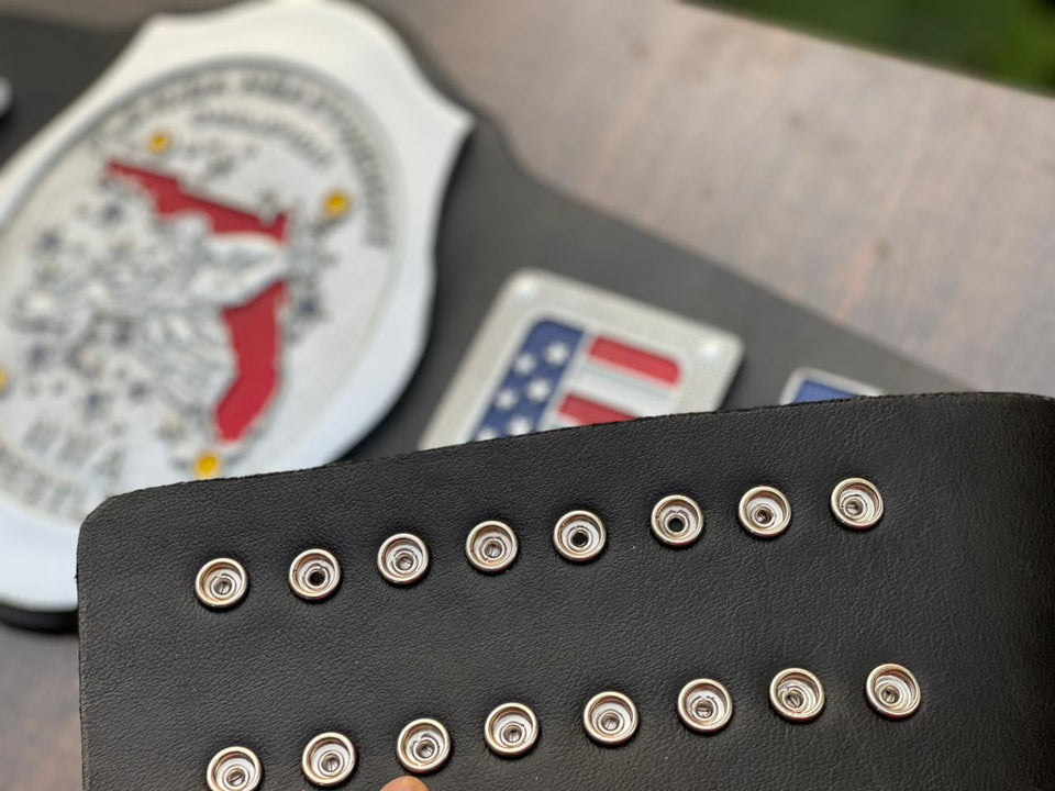 NWA Florida Heavyweight Championship replica belt, strap snaps close-up