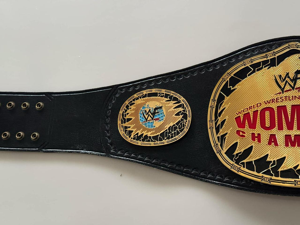WWF Women's Championship replica belt, side plate and strap eyelets close-up